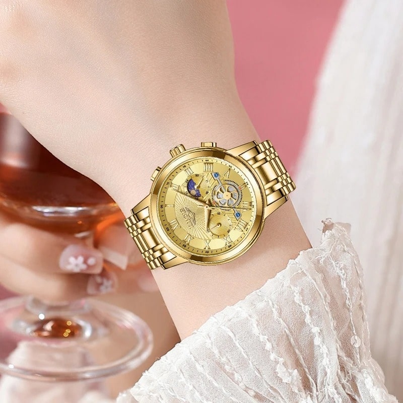 Gold-tone women's chronograph watch with moon phase and mechanical movement