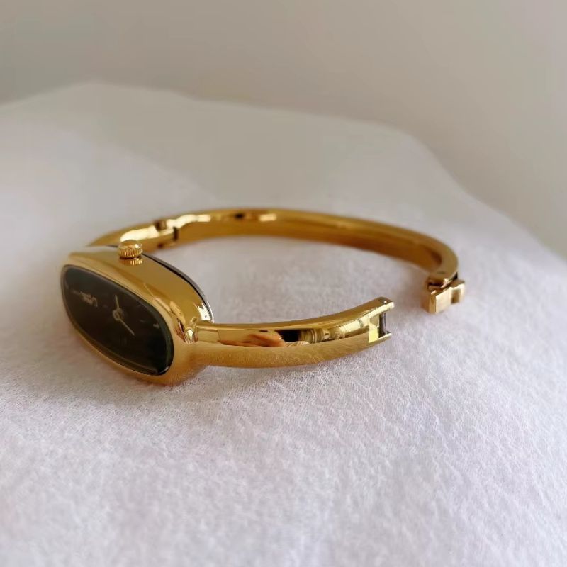 Women's Gold Bangle Watch with Oval Black Dial, Water Resistant