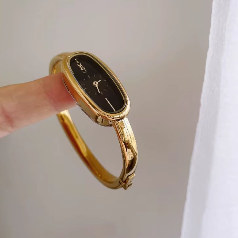 Women's Gold Bangle Watch with Oval Black Dial, Water Resistant