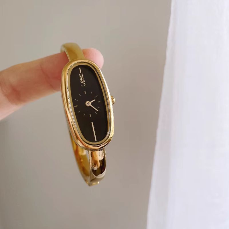 Women's Gold Bangle Watch with Oval Black Dial, Water Resistant