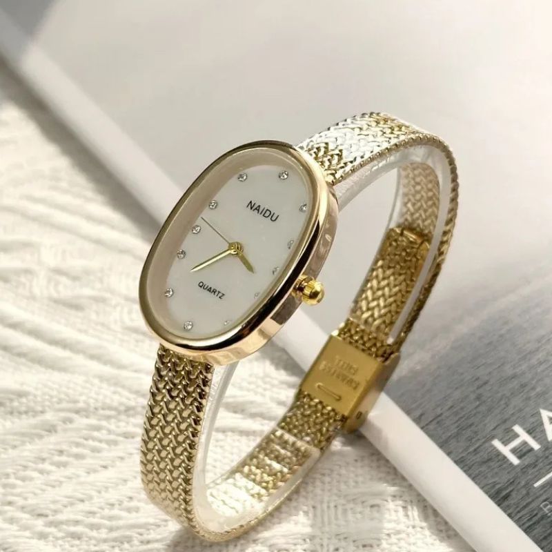 Women's Oval Gold Stainless Steel Mini Watch