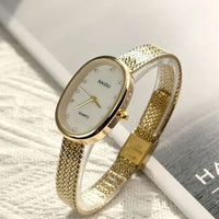 Women's Oval Gold Stainless Steel Mini Watch