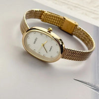 Women's Oval Gold Stainless Steel Mini Watch