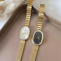 Women's Oval Gold Quartz Watch with Wide Minimalist Bracelet