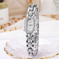 Elegant Women's Quartz Watch with Oval Dial Set with Rhinestones and Crystals
