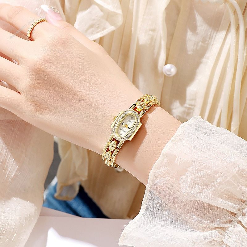Elegant Women's Quartz Watch with Oval Dial Set with Rhinestones and Crystals