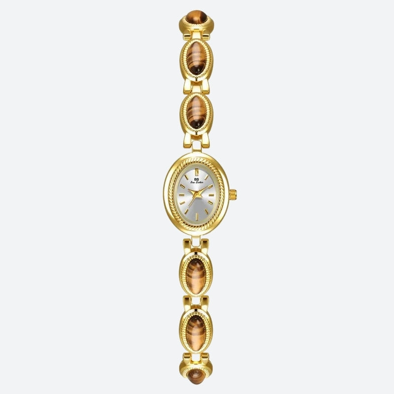 Vintage Oval Women's Watch, gold case with silver dial, bracelet adorned with gold and brown oval links, in a refined and timeless style