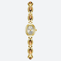 Vintage Oval Women's Watch, gold case with silver dial, bracelet adorned with gold and brown oval links, in a refined and timeless style