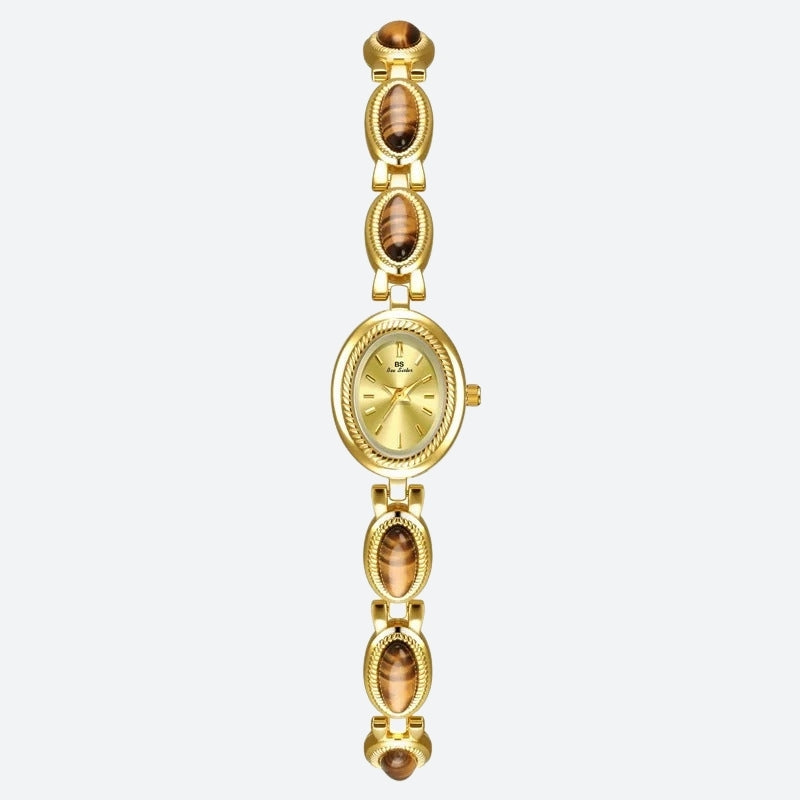Vintage Oval Women's Watch, gold case with gold dial, bracelet adorned with gold and brown oval links, with a refined and timeless style Image