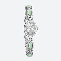 Vintage Oval Women's Watch, silver case with silver dial, bracelet adorned with silver and green oval links, elegant and refined design
