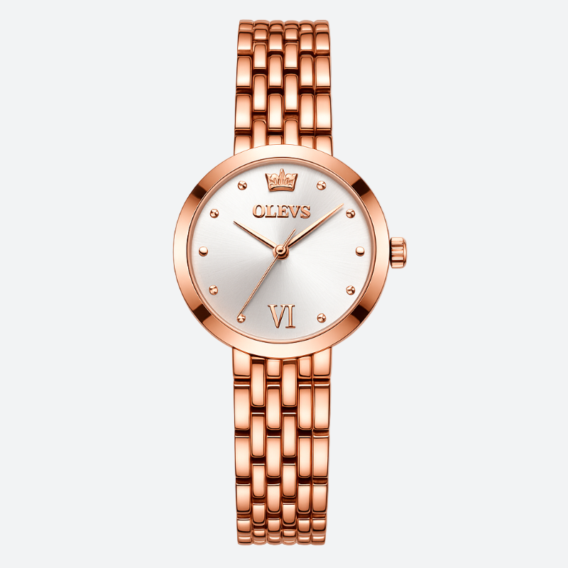 Luxury vintage women's watch in rose gold, with an elegant silver dial and a polished steel bracelet.