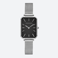 Vintage women's watch with a rectangular gold shape and fine mesh, set on a light background, with meticulous details and a chic look.