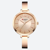 Women's Round Minimalist Quartz Watch in Metal (2)