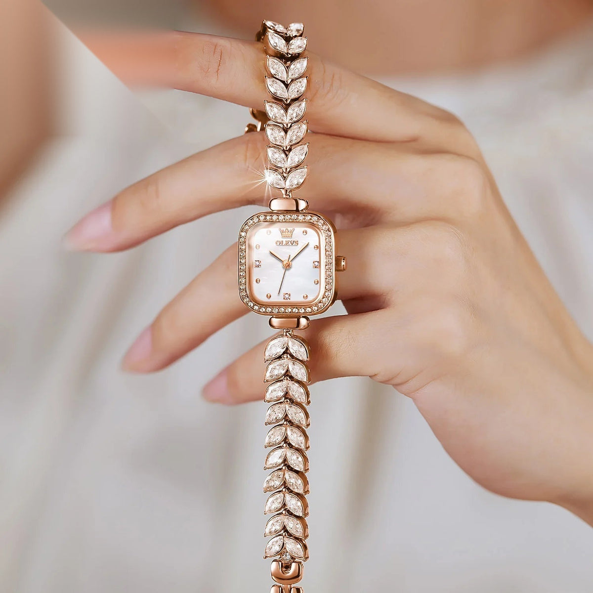 Vintage women's square watch in rose gold, mother-of-pearl dial and rhinestone jeweled bracelet