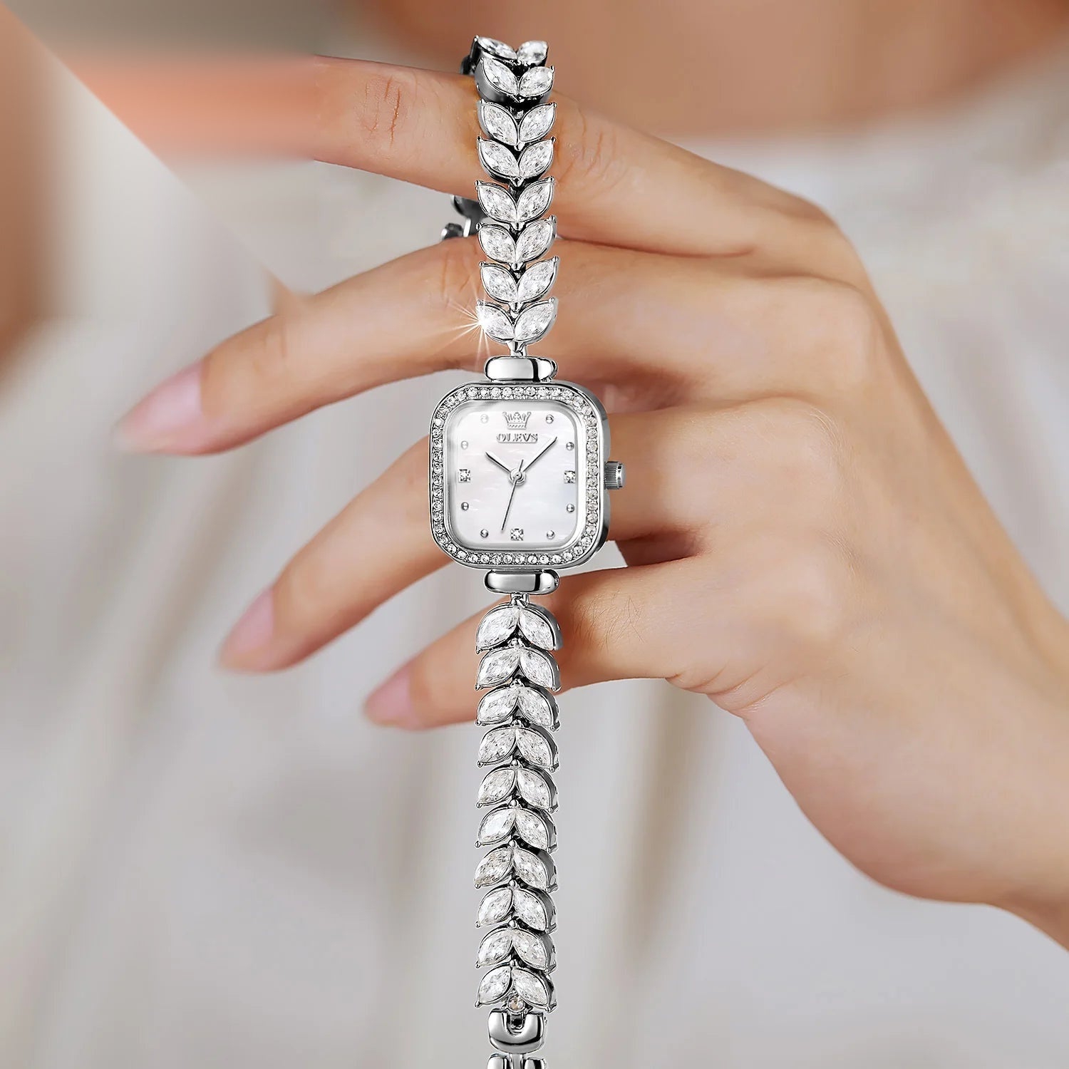 Vintage women's square silver watch, mother-of-pearl dial and rhinestone bracelet